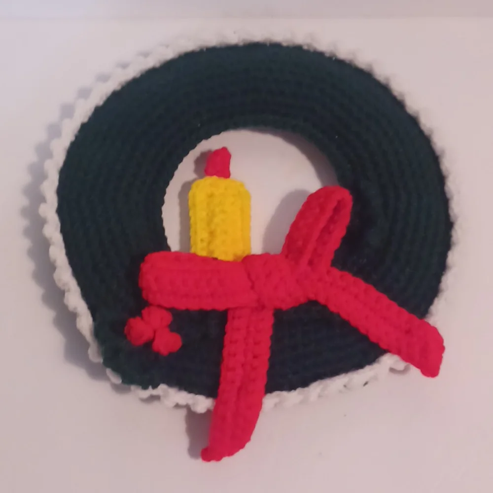 Crocheted Christmas Wreath with Candle, Bow, and Holly Berries